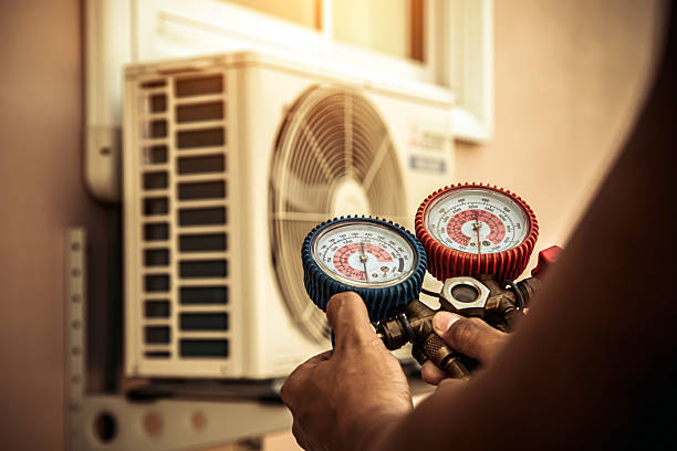 Professional Hvac technician working in Ramer, TN